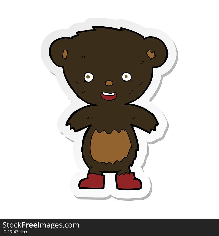 sticker of a cartoon black bear cub