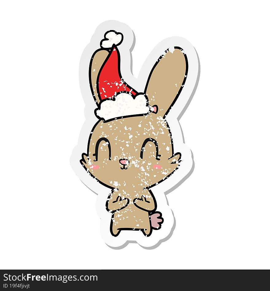 cute hand drawn distressed sticker cartoon of a rabbit wearing santa hat. cute hand drawn distressed sticker cartoon of a rabbit wearing santa hat