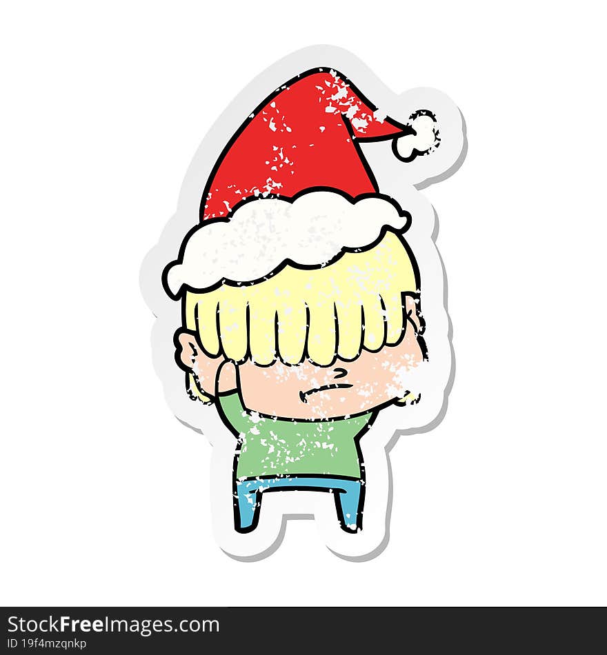 Distressed Sticker Cartoon Of A Boy With Untidy Hair Wearing Santa Hat