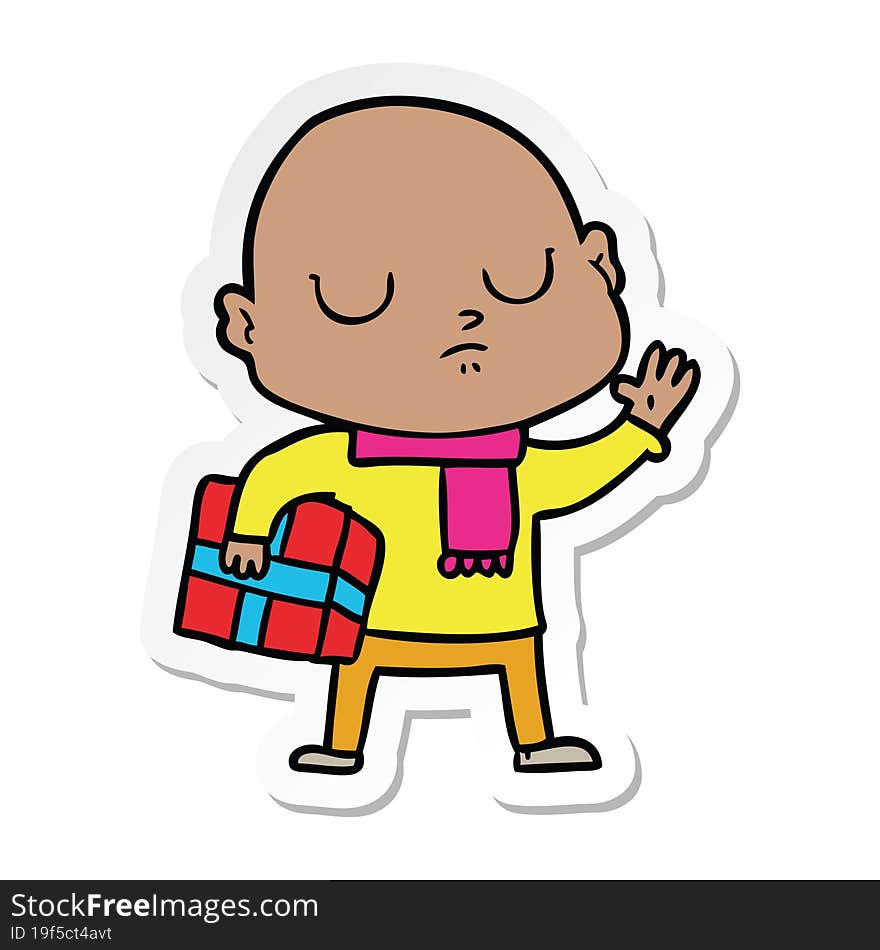 sticker of a cartoon bald man with xmas gift