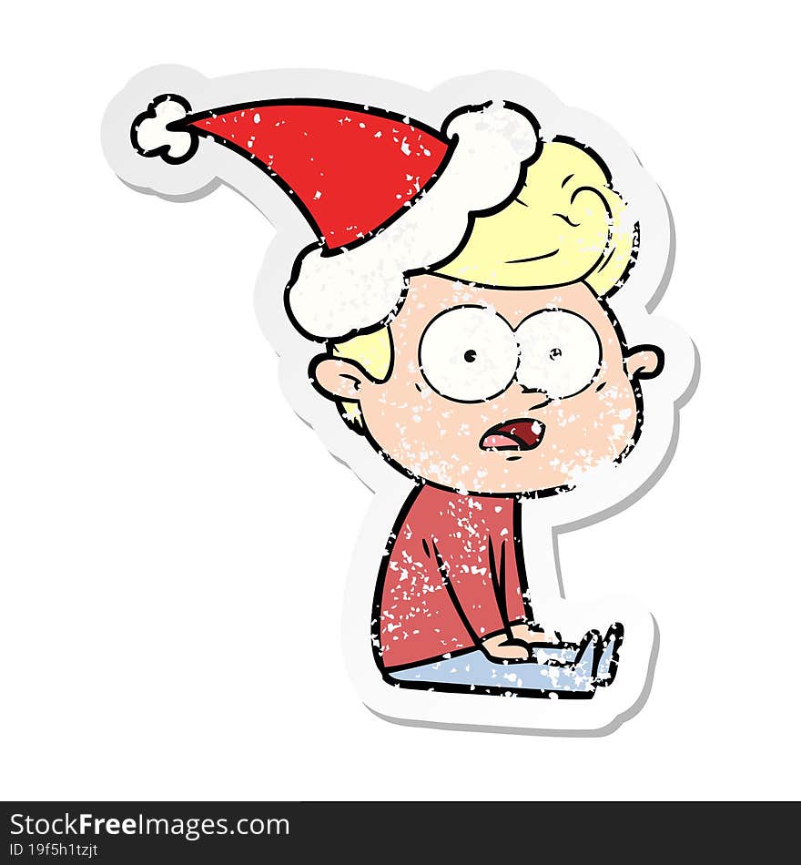 Distressed Sticker Cartoon Of A Staring Man Wearing Santa Hat