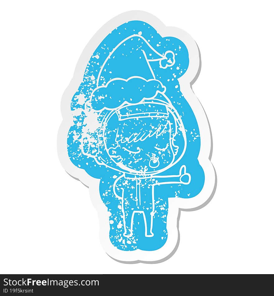 cartoon distressed sticker of a pretty astronaut girl giving thumbs up wearing santa hat