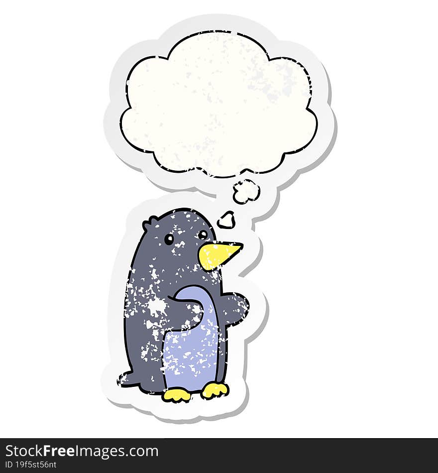 cartoon penguin and thought bubble as a distressed worn sticker