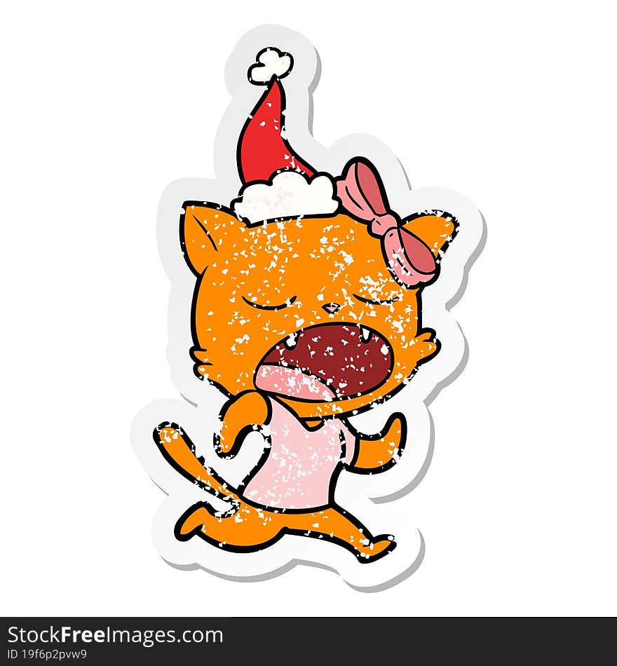 Distressed Sticker Cartoon Of A Yawning Cat Wearing Santa Hat