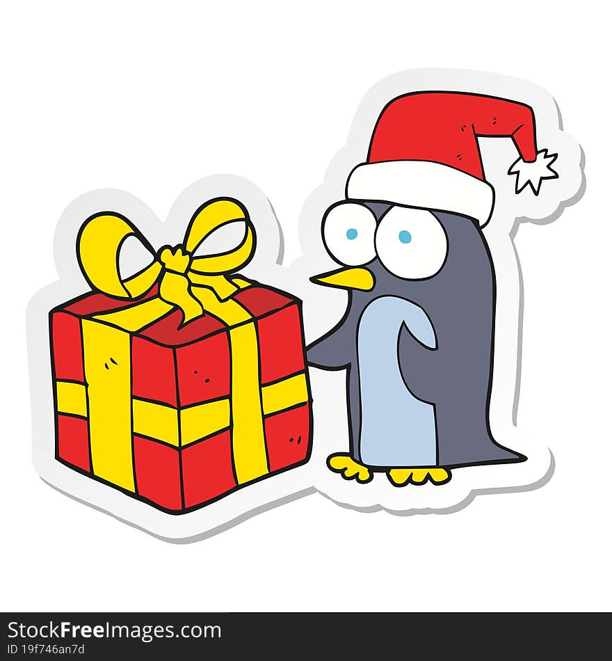 sticker of a cartoon christmas penguin with present