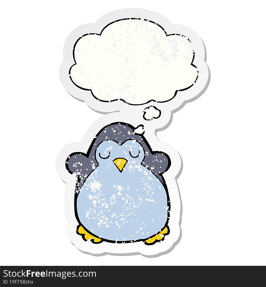 cartoon penguin and thought bubble as a distressed worn sticker