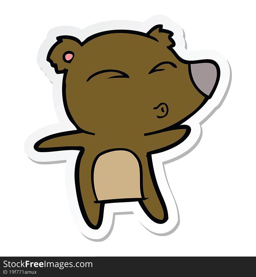 sticker of a cartoon whistling bear