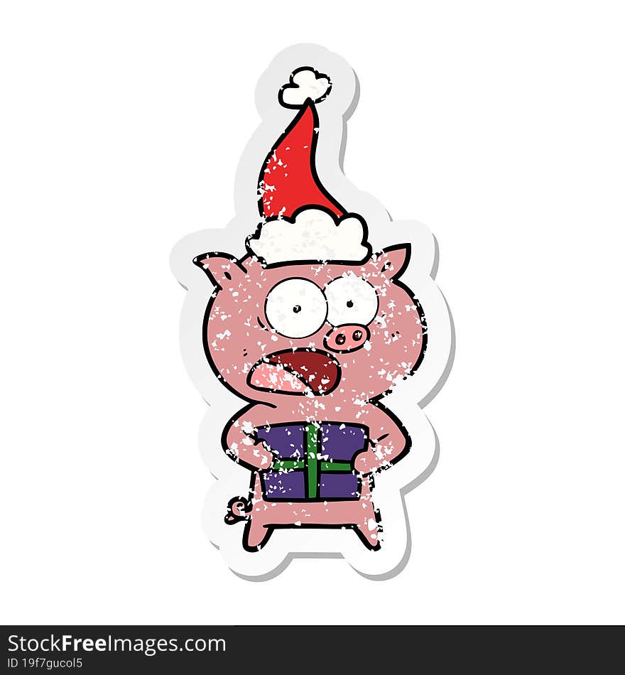 hand drawn distressed sticker cartoon of a pig with christmas present wearing santa hat