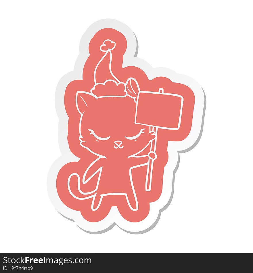 cute cartoon  sticker of a cat with sign wearing santa hat