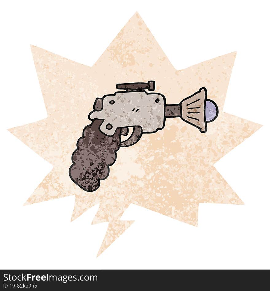 cartoon ray gun and speech bubble in retro textured style