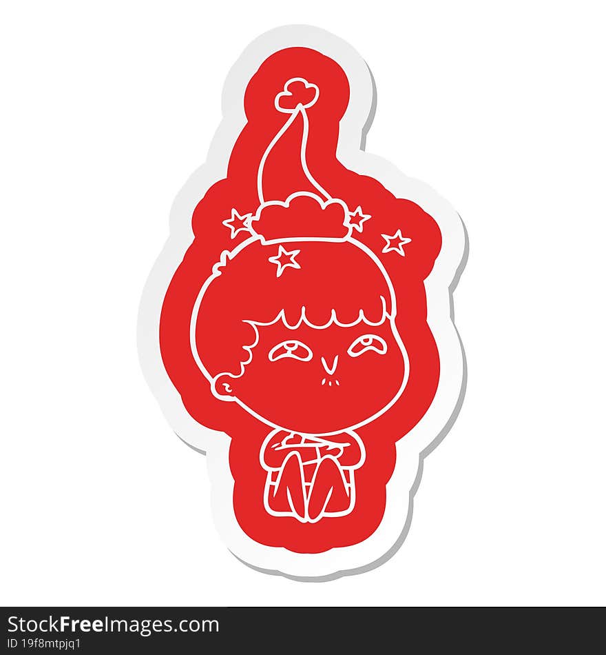 cartoon  sticker of a amazed boy wearing santa hat