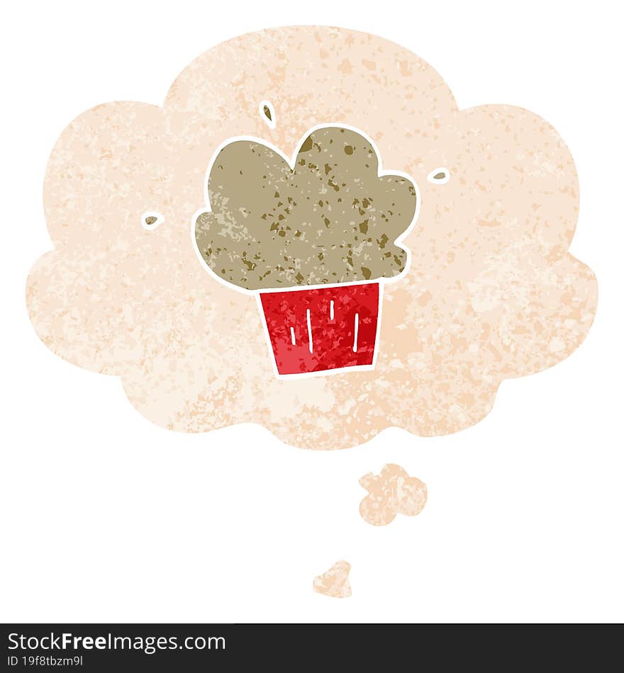 cartoon muffin with thought bubble in grunge distressed retro textured style. cartoon muffin with thought bubble in grunge distressed retro textured style