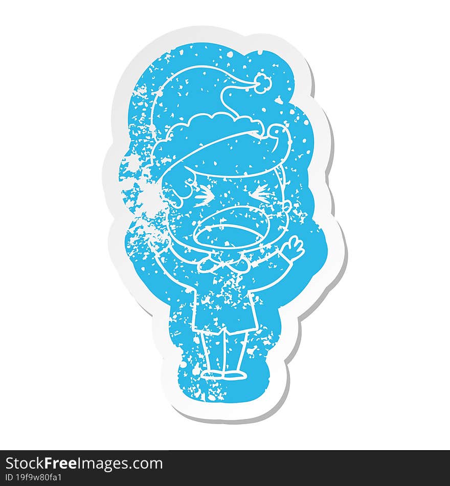 cartoon distressed sticker of a shouting man wearing santa hat