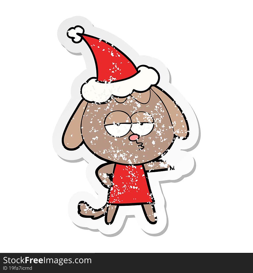 distressed sticker cartoon of a bored dog wearing santa hat