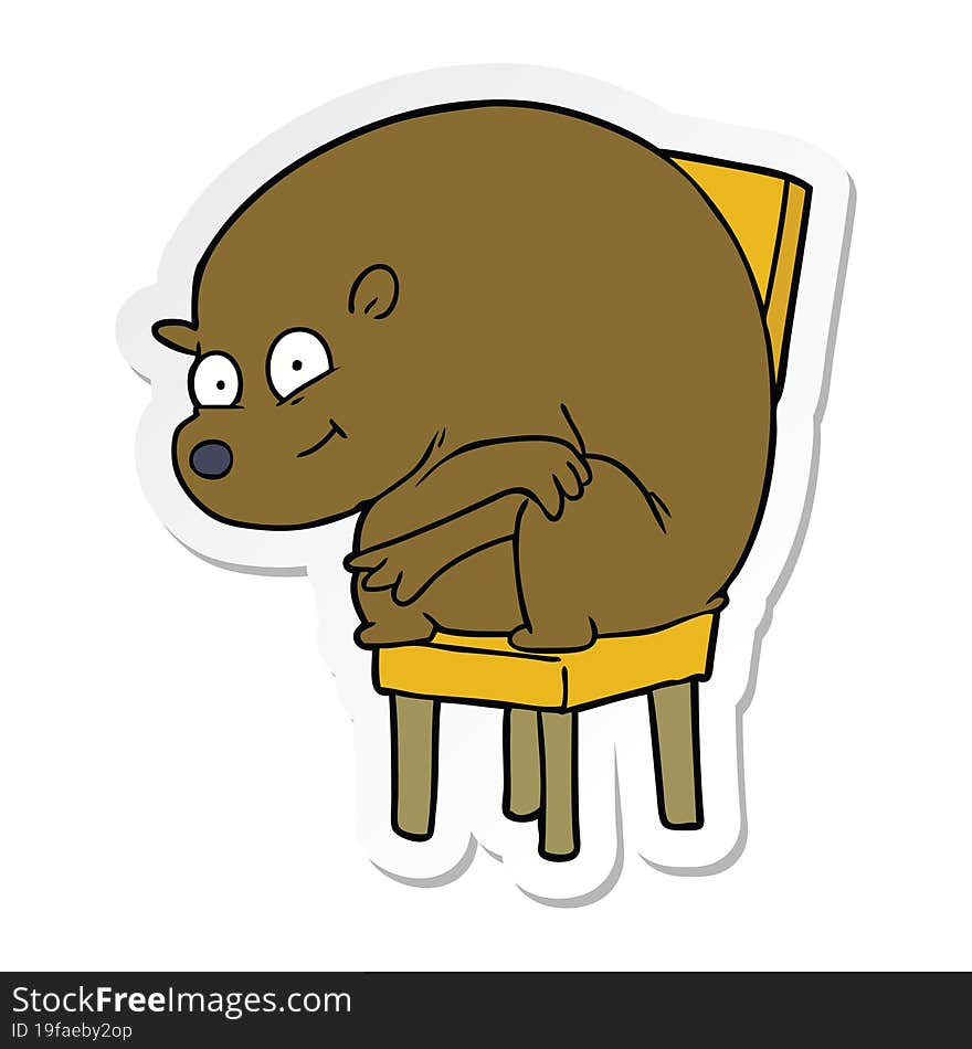 sticker of a cartoon bear sitting on chair