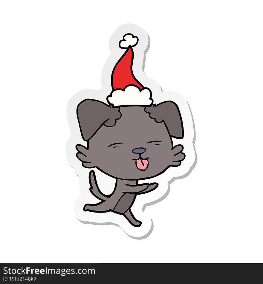 sticker cartoon of a dog sticking out tongue wearing santa hat