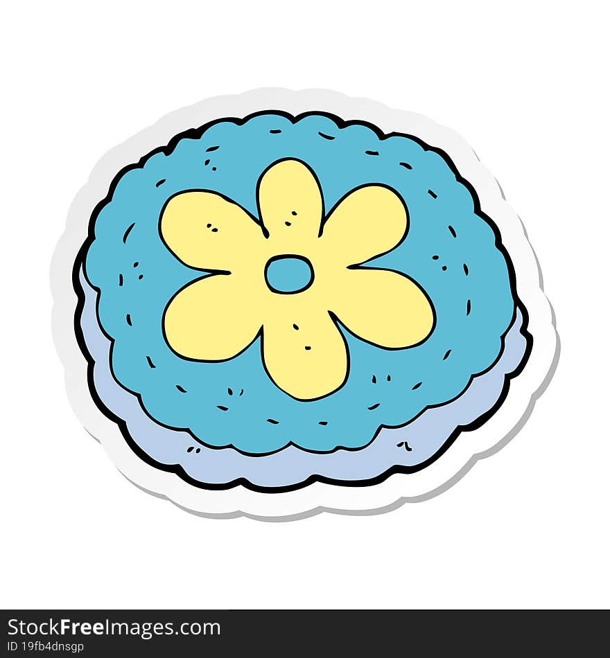 sticker of a cartoon baked biscuit