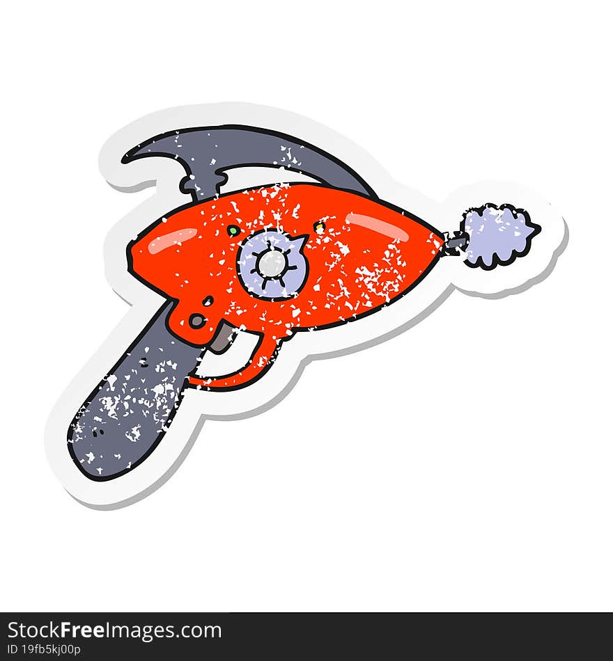 distressed sticker of a cartoon ray gun