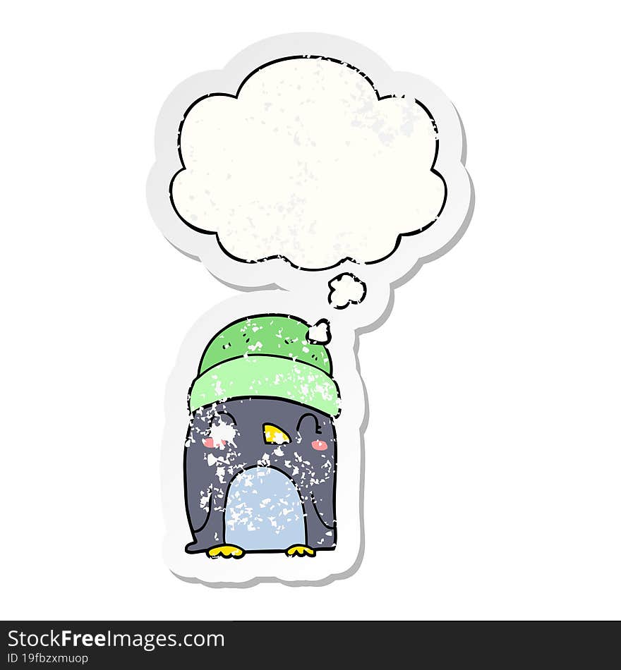 cute cartoon penguin and thought bubble as a distressed worn sticker