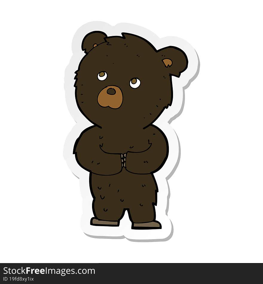 sticker of a cartoon black bear cub