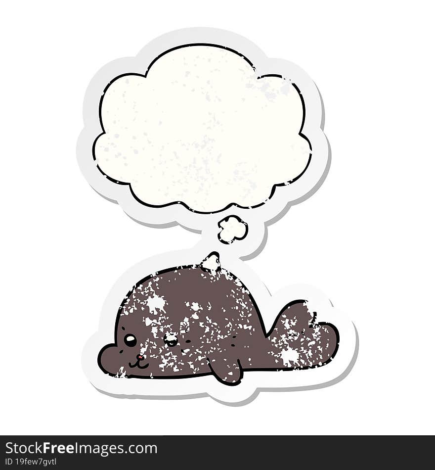 cartoon baby seal and thought bubble as a distressed worn sticker