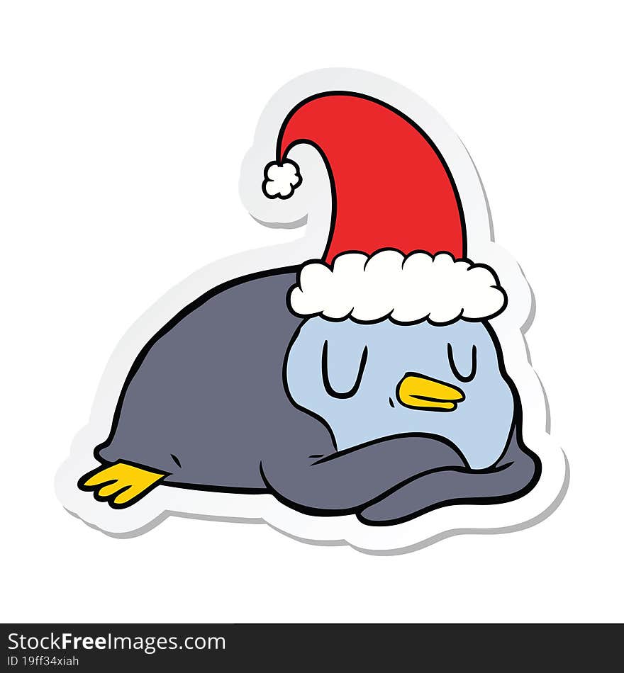 sticker of a cartoon penguin wearing christmas hat