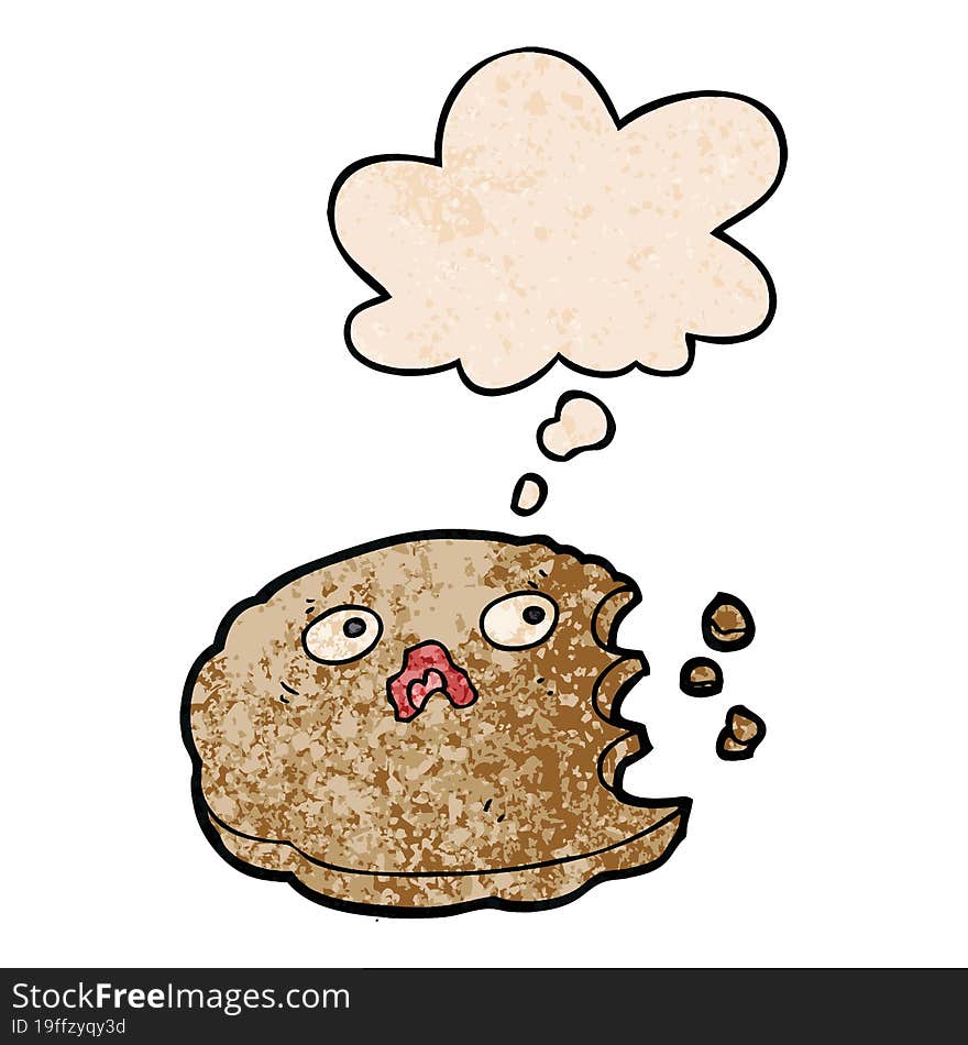 cartoon bitten cookie and thought bubble in grunge texture pattern style