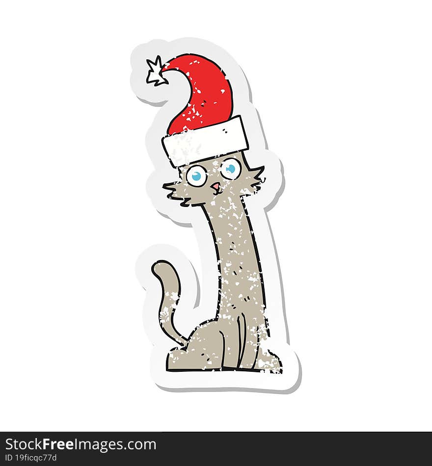 retro distressed sticker of a cartoon cat in christmas hat