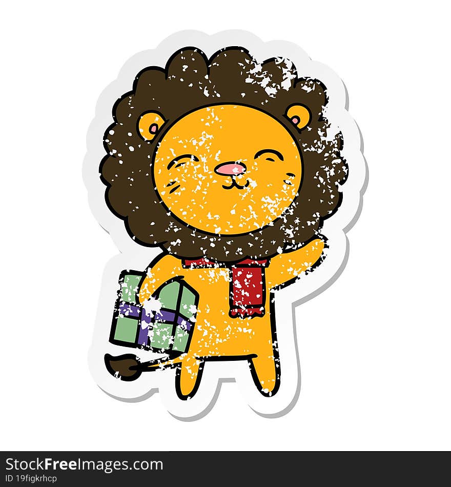 Distressed Sticker Of A Cartoon Lion With Christmas Present