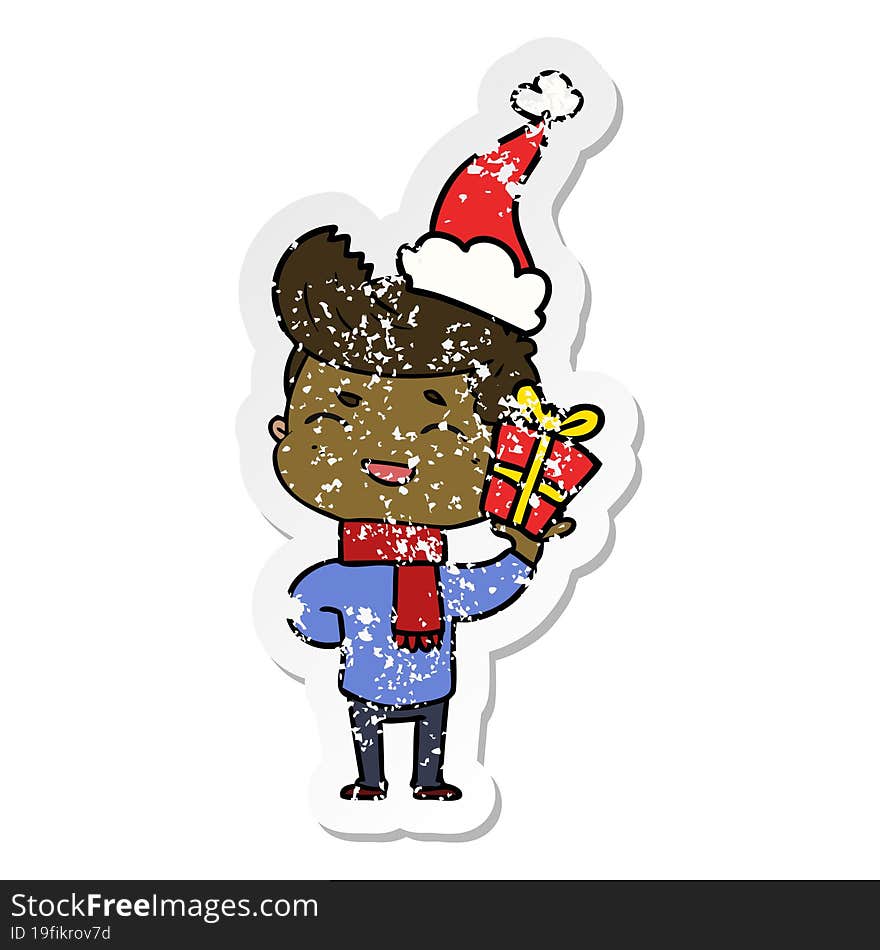 distressed sticker cartoon of a man laughing wearing santa hat