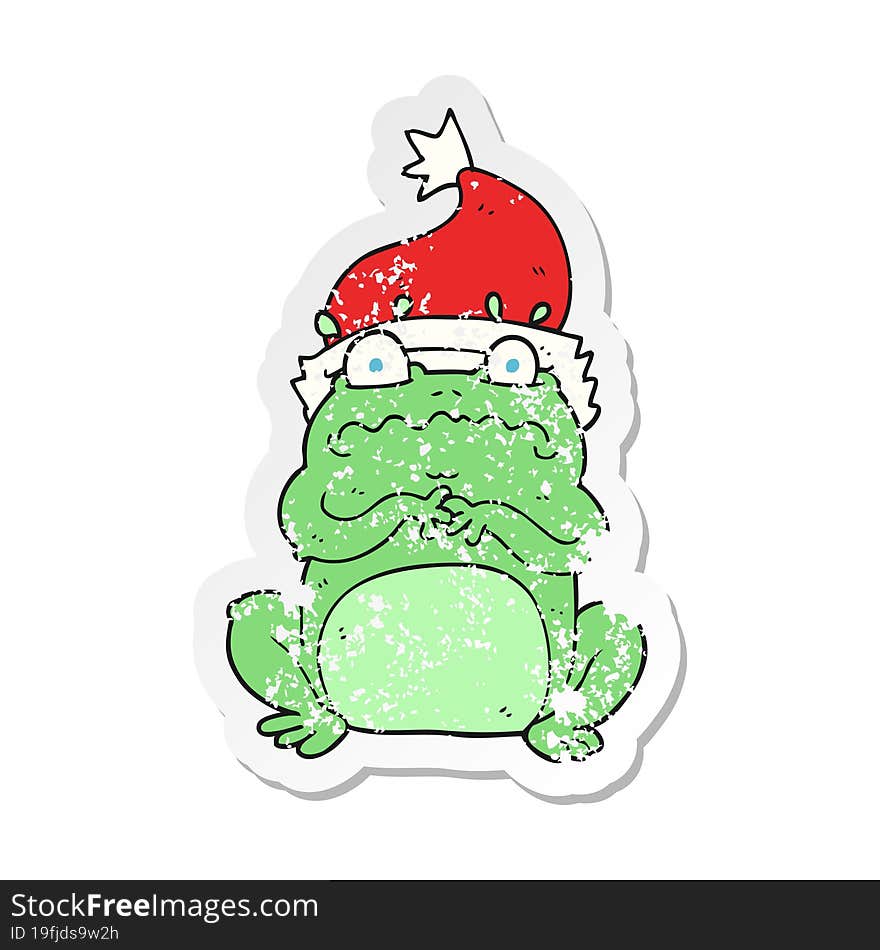 retro distressed sticker of a cartoon frog in christmas hat