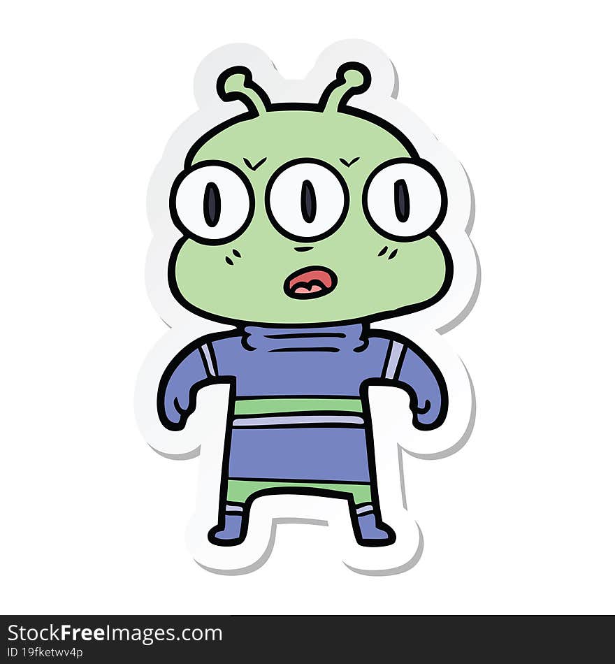 sticker of a cartoon three eyed alien