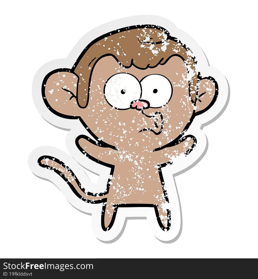 distressed sticker of a cartoon surprised monkey