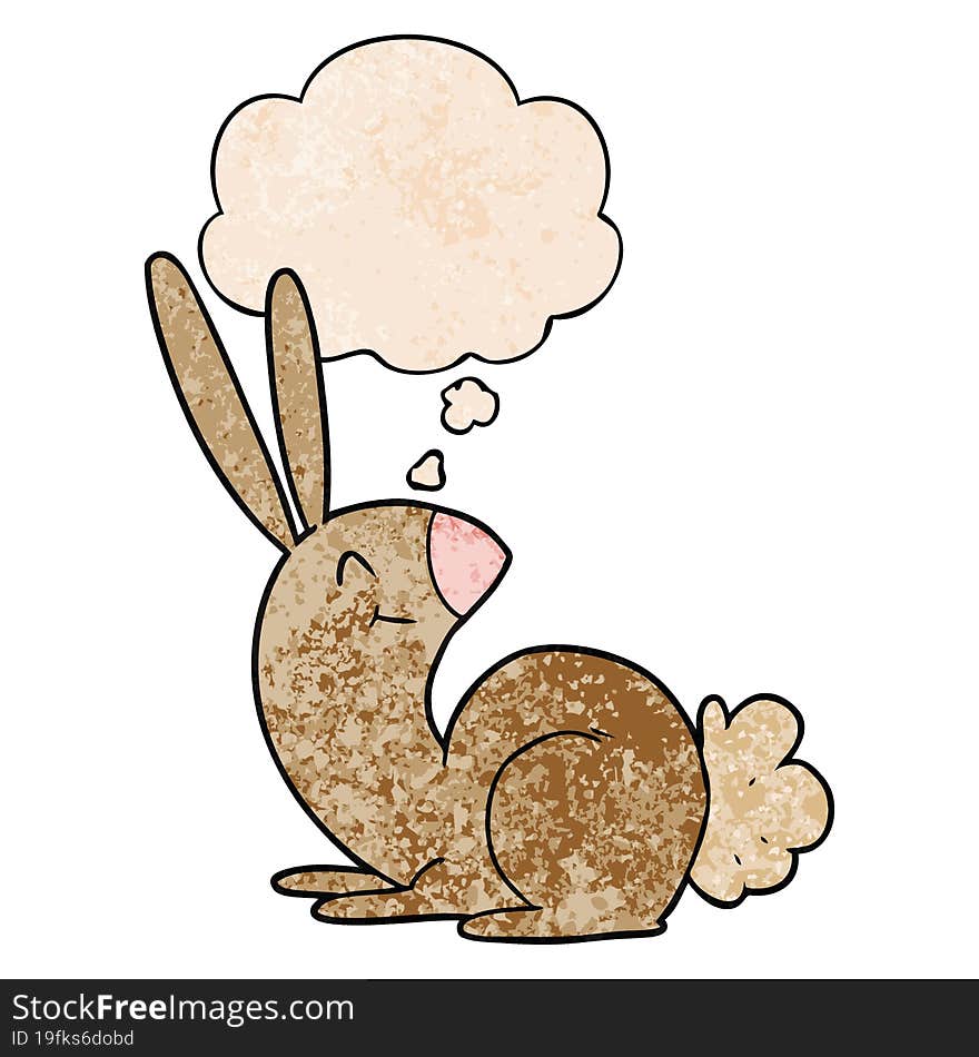 cute cartoon rabbit and thought bubble in grunge texture pattern style