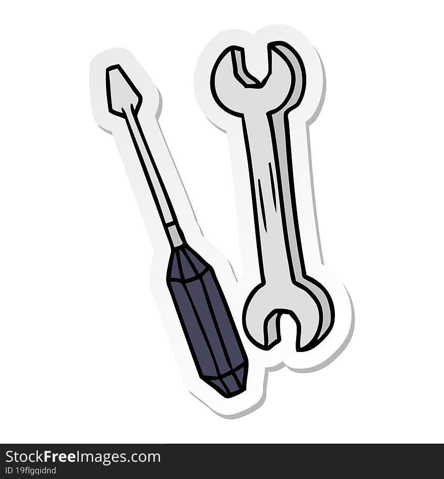 hand drawn sticker cartoon doodle of a spanner and a screwdriver