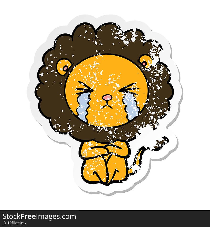 distressed sticker of a cartoon crying lion sitting huddled up