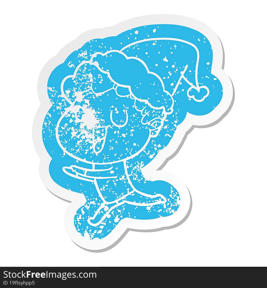 Laughing Cartoon Distressed Sticker Of A Man Running Wearing Santa Hat