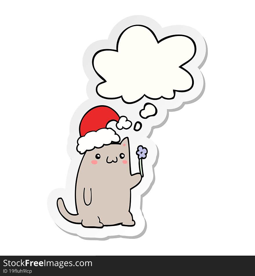 cute cartoon christmas cat with thought bubble as a printed sticker