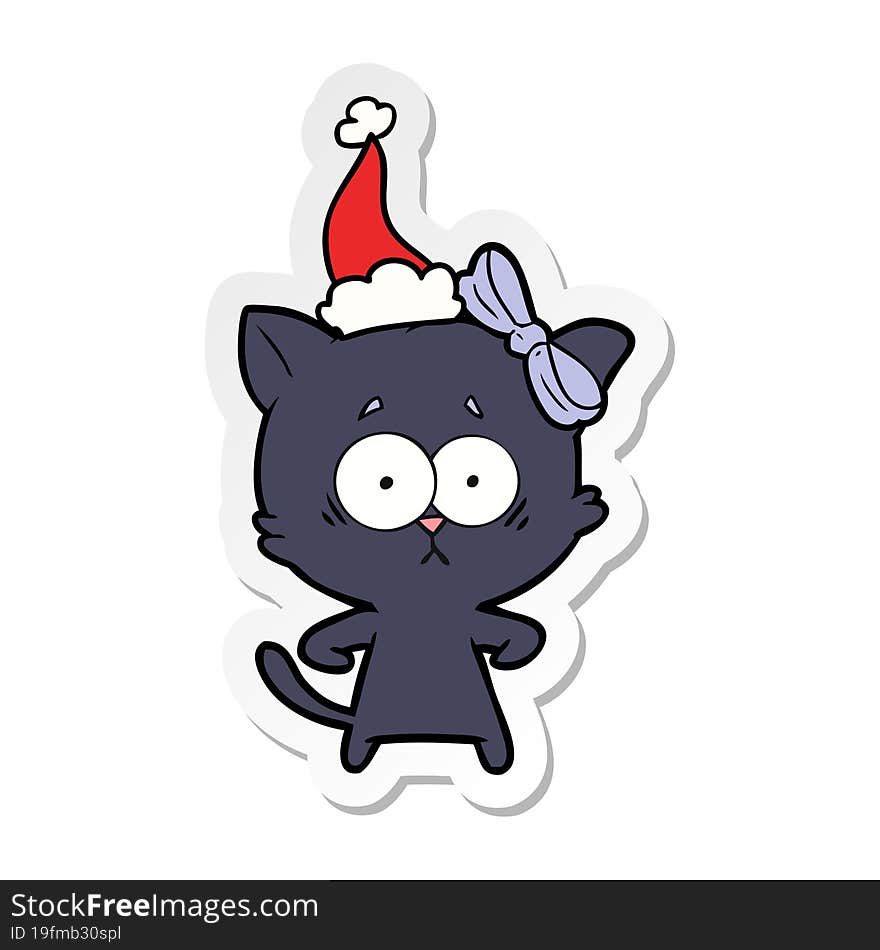 hand drawn sticker cartoon of a cat wearing santa hat