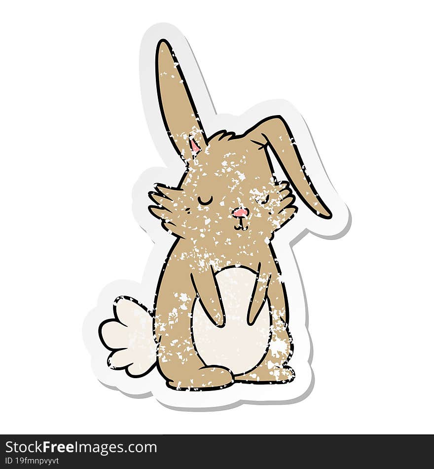 distressed sticker of a cartoon sleepy rabbit