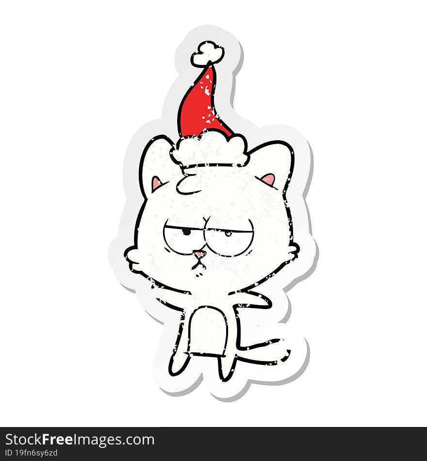 bored distressed sticker cartoon of a cat wearing santa hat