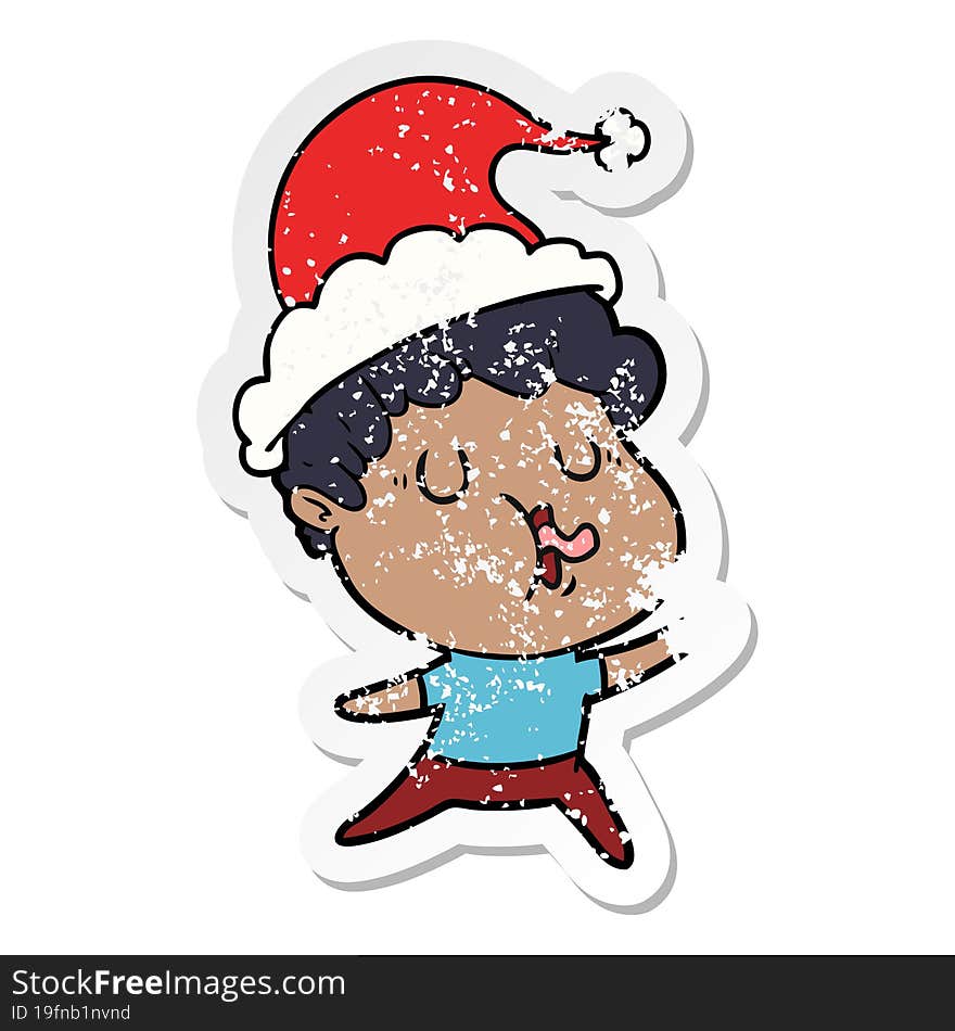 distressed sticker cartoon of a man singing wearing santa hat