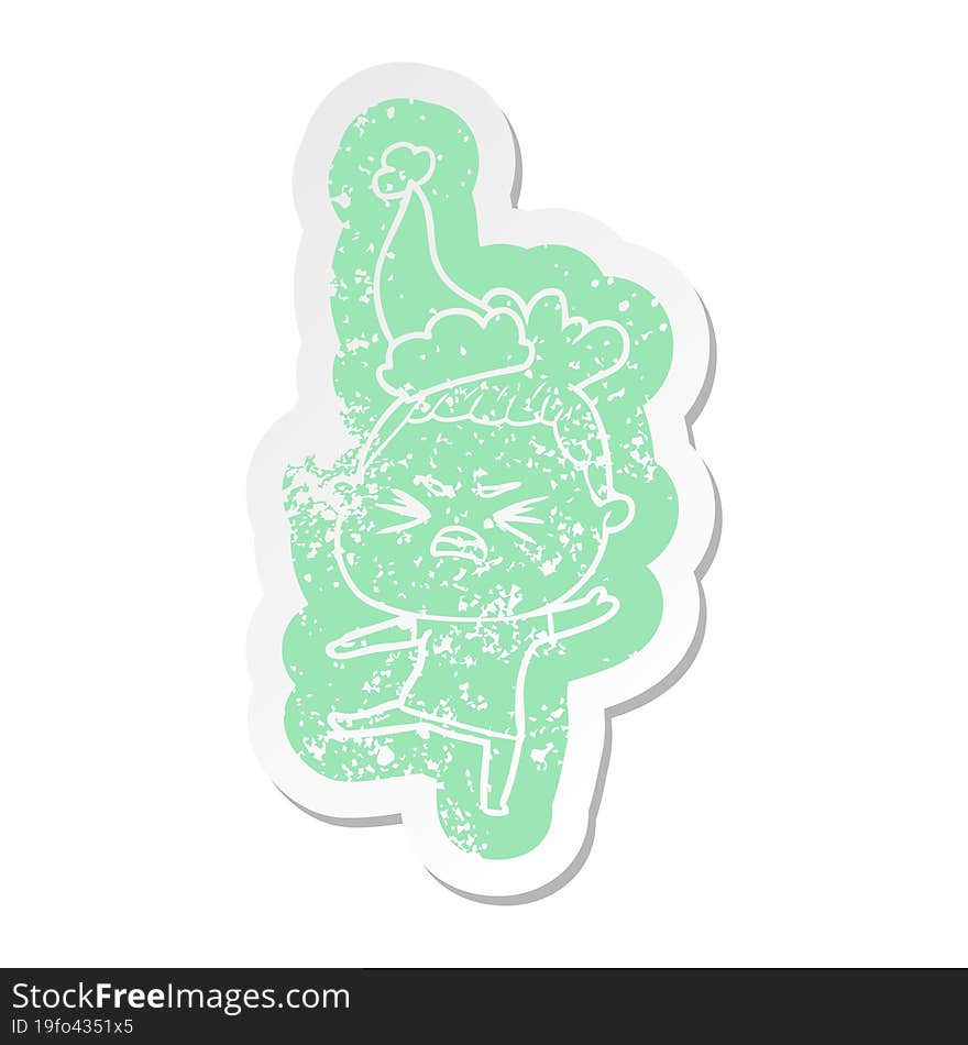 cartoon distressed sticker of a angry woman wearing santa hat