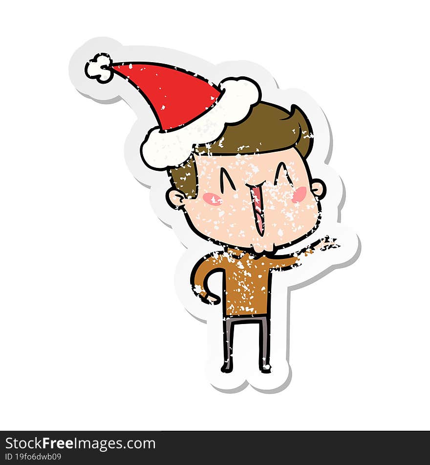 distressed sticker cartoon of a excited man wearing santa hat