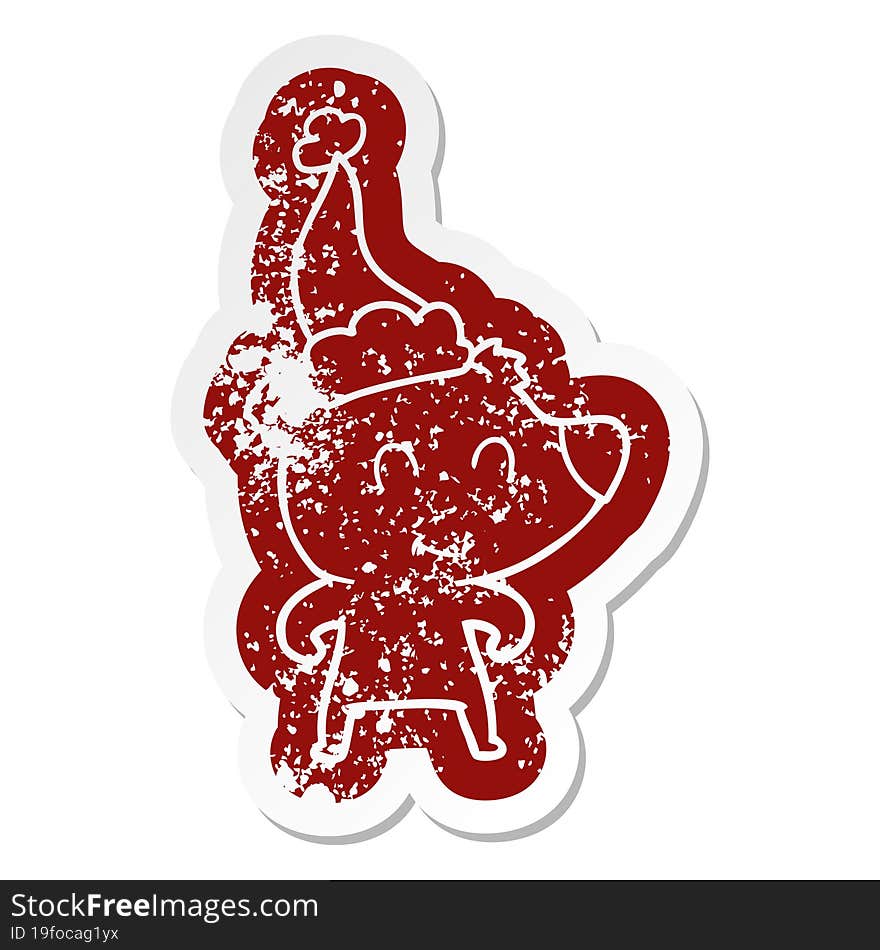 Female Bear Cartoon Distressed Sticker Of A Wearing Santa Hat