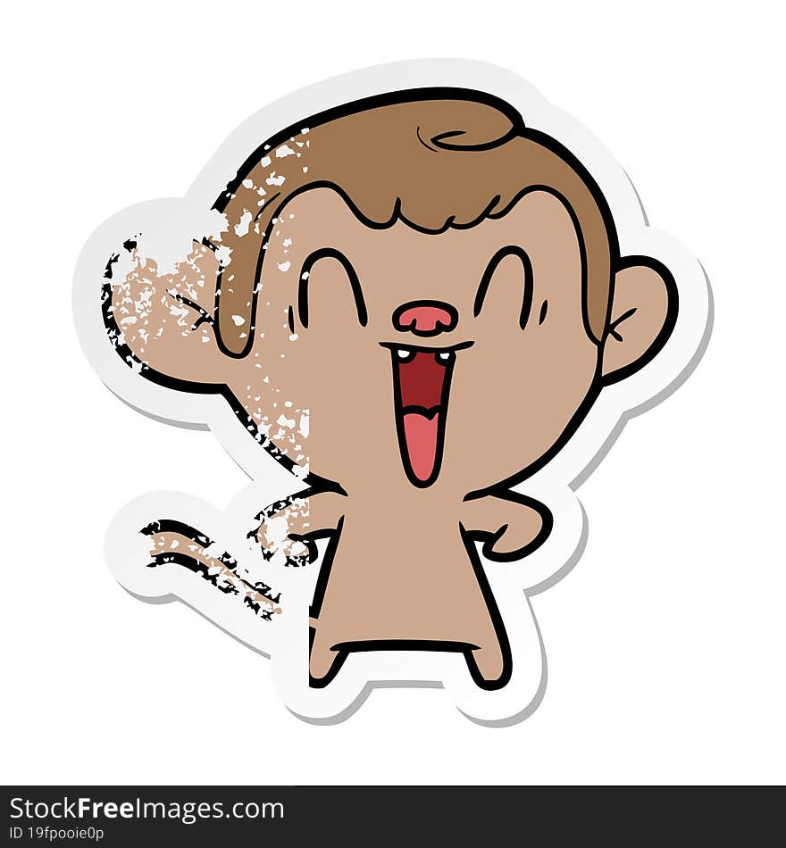 distressed sticker of a cartoon laughing monkey