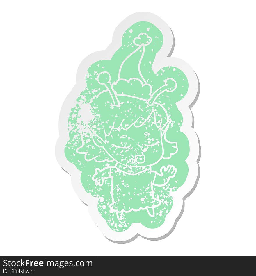 cute alien girl cartoon distressed sticker of a wearing santa hat