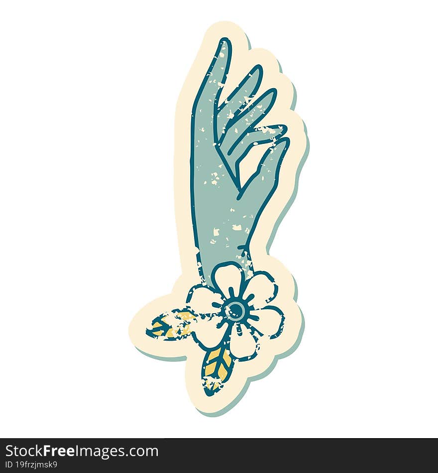 distressed sticker tattoo style icon of a hand and flower