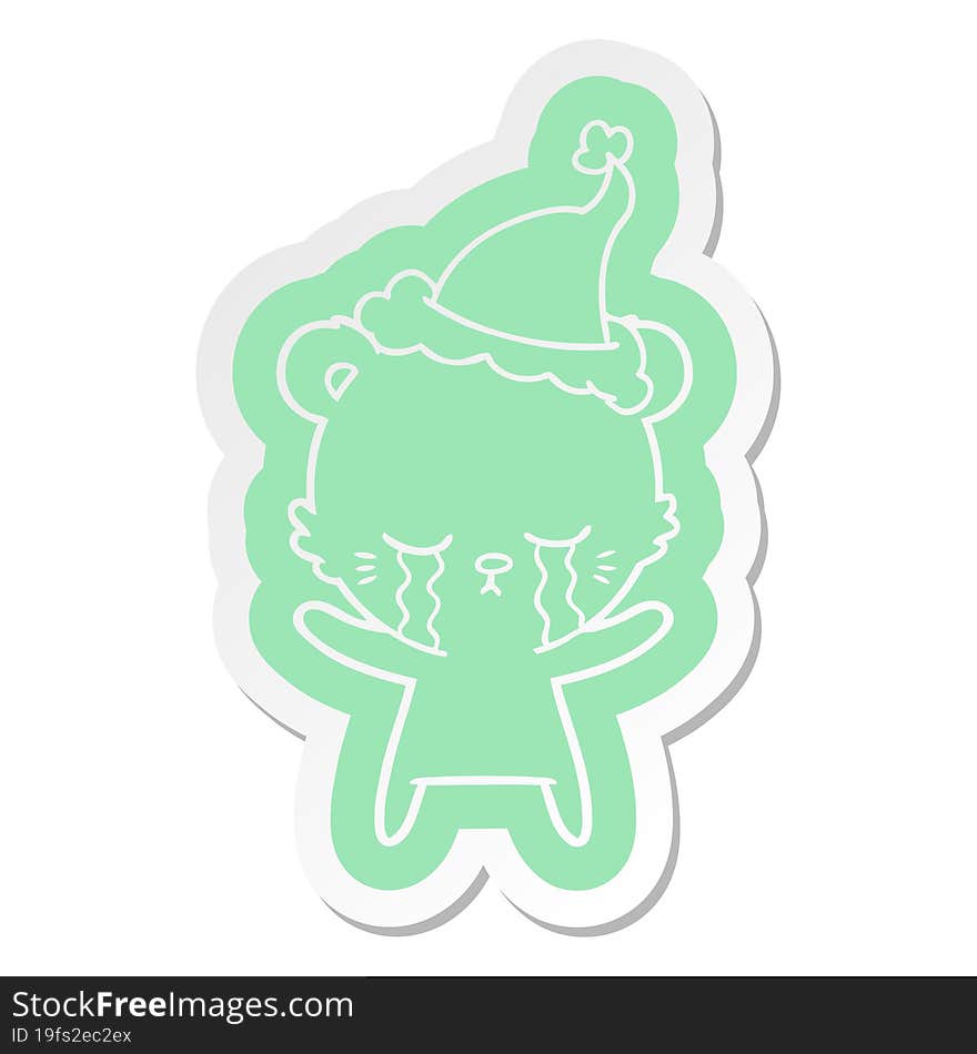 crying cartoon  sticker of a polarbear wearing santa hat