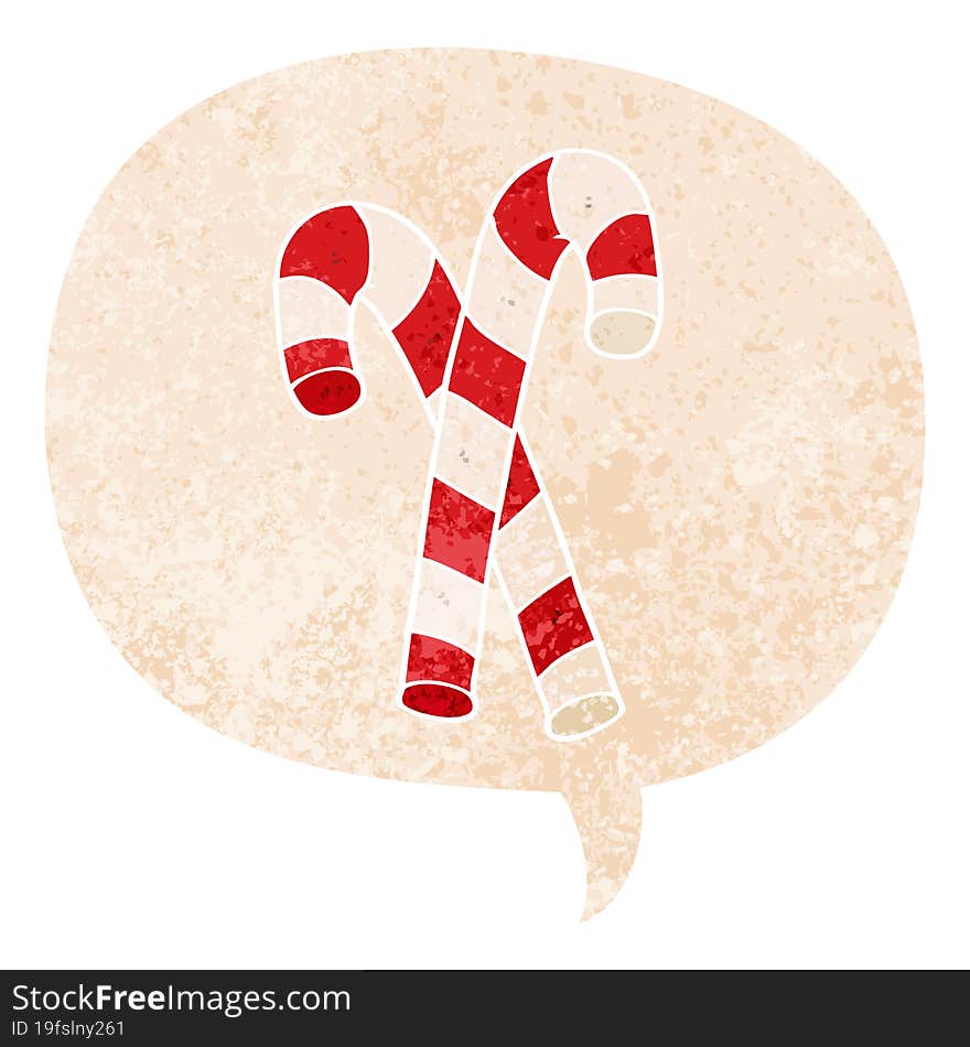 cartoon candy canes and speech bubble in retro textured style